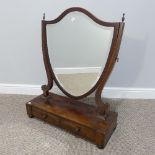A George III-style inlaid mahogany shield-shaped Toilet Mirror, raised on a base with two small