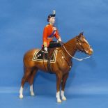 A Beswick figure of HRH Queen Elizabeth II, mounted on Imperial, Trooping the Colour, with factory