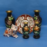 A pair of 20thC Chinese cloisonné Vases, the black enamelled ground with floral decoration, H