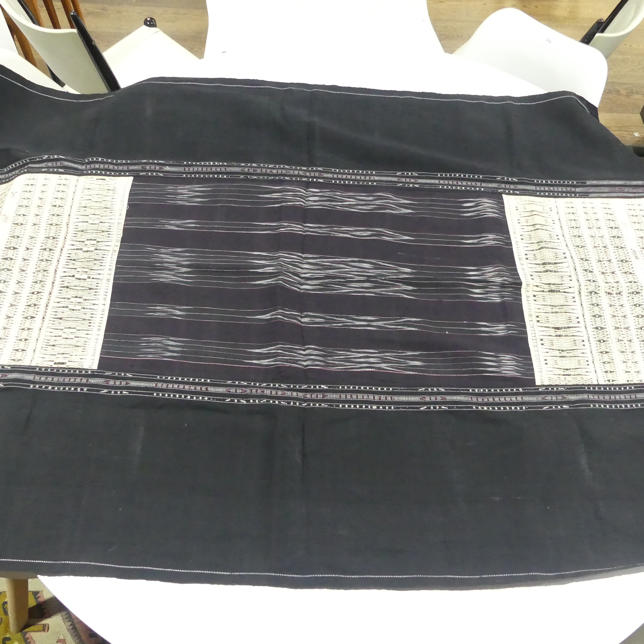 An Indonesian ceremonial Textile: Batak 'ULOS RAGI HIDUP', formed of three Ikat weave panels and end