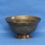 A Chinese bronze 'Singing' Bowl', Qing Dynasty, 19th century, with turned and stepped rim, decorated