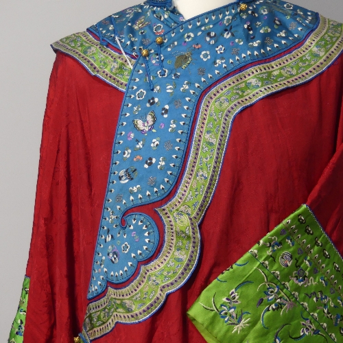 An early 20thC Chinese figured red silk Wedding Robe, edged with contrasting fabric and shaped - Image 2 of 10