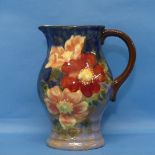 A Royal Doulton floral pattern Jug, with factory marks and numbered D8227 to base, H 21cm.