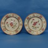 A pair of 18thC Chinese porcelain famille rose Plates, decorated in typical style, depicting