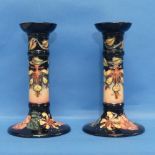 A pair of Moorcroft 'Oberon Honeysuckle' pattern Candlesticks, impressed and painted marks to