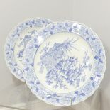 A pair of Oriental blue and white Chargers, depicting a blossoming tree, with decoration to