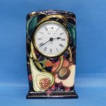 A Moorcroft pottery 'Queen's Choice' pattern Mantel Clock, designed by Emma Bossons, dated 2000, H