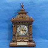 An H.A.C. of Württemberg 14-Day Strike Mantel Clock, in walnut gothic style case, mounted with a