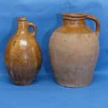A large antique German salt-glazed stoneware Flagon, with handle and incised 'Z', H 36.5cm, together