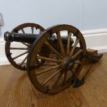 A bronzed metal model Cannon, on field carriage, 20th century, the 36cm barrel mounted on a wooden