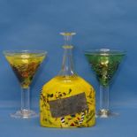 A Kosta Boda art glass Decanter, the body in yellow with splashes of other colours, together with