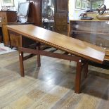 A vintage Danish teak Metamorphic Coffee/Dining Table, circa 1970's, by V Modelfabrik, the