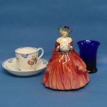 A Royal Doulton 'Genevieve' Figure, together with a porcelain Cup and Saucer and a blue glass