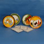 A collection of four limited edition Wedgwood 'Bizarre' Clarice Cliff style Plates, to include '