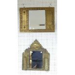 An early 20thC embossed brass Hall Mirror, with two clothes brushes, W 45cm x H 49.5cm, together