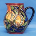 A Moorcroft pottery 'Pleuriana' pattern Jug, designed by Rachel Bishop, dated 2003, H 13cm.