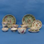 A pair of Chinese famille rose Plates, decorated in typical style on celadon glaze, together with