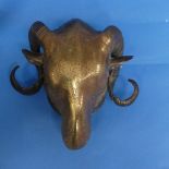 A patinated bronze Cow head wall mount, 23cm high x 19cm wide, together with a gilt-bronze Rams head