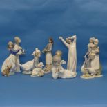 A small quantity of Lladro Figures, comprising a figure of a Girl with a Candlestick, a young boy