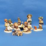 A small quantity of Hummel Figures, to include 'Sensitive Hunter', 'Shepherd's Boy', etc. (8)