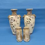 A pair of large Oriental Satsuma Porcelain Vases, each with raised floral and bird decoration to