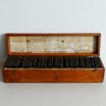 A collection of Magic Lantern slides, in wooden storage box, Set no. 266 relating to Mottoes and