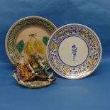 A continental faience Bowl, signed Valencia to base, depicting lemons handing from branches,