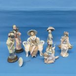 A small quantity of Lladro, to include a Geisha holding a fan, Geisha seated on bench and Geisha