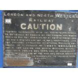 Railwayana; an original cast iron London and North Western Railway CAUTION Sign, the raised