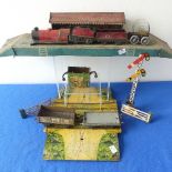 A Collection of Triang Tinplate O Gauge items, loco, tender, rolling stock, platform, station, level