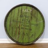 A vintage metal bound Scottish Whisky oak Barrel Top, dated 1974, 61cm diameter, iron banding held i