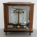A set of antique technical scales in glazed case, Griffin & Tatlock Ltd,  H 41cm x 27cm x 37cm