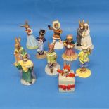 A small quantity of Royal Doulton Bunnykins Figurines, comprising Christmas Surprise, Tourist