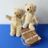 A Steiff Charly bear in Suitcase box, H 24cm approx, serial number 012938, together with a vintage