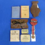 A large collection of militaria, inc. gas masks, a piece of a WWII 500lb bomb WWI, a war medal for