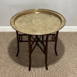 An early 20thC Oriental rosewood Benares Table, with Brass Top embossed with character marks and