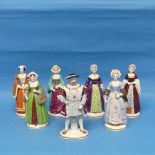 A set of seven Sitzendorf figures of King Henry VIII and his six wives, printed marks to base,