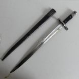 An 1886 Portuguese Bayonet and steel Scabbard, two piece wooden grip with studs,  marked on the