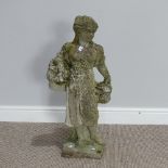 Garden statuary; a reconstituted stone figure of a flower seller, H 76cm