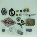 A collection of reproduction German WW2 period Badges and Insignia, including an Infantry Assault B