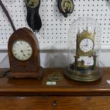 A vintage American anniversary Clock, with glass dome, 26cm high, and an oak cased Gothic mantel