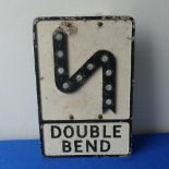 An original pre Worboys Double Bend road sign; Cast  rectangular sign with integral fruitgum