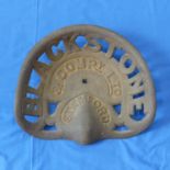 An antique Tractor Seat, by Blackstone & Company, Stamford, w 44cm x d 39cm.
