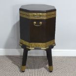 A reproduction Georgian-style wine cooler, of octagonal form, bound in brass with etched decoration,