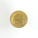 A George II gold Two Guinea coin, dated 1738.