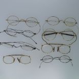 Eight pairs of antique and vintage Glasses and Pinz Nez, four with cases (8)