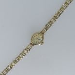 A 9ct yellow gold lady's Rotary Wristwatch, on a 9ct gold bracelet strap, gross total weight 12.