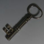 A novelty silver plated Corkscrew bottle opener, in the form of a key, 14.5cm long.