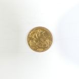 An Elizabeth II gold Soveriegn, dated 1968.