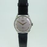 A vintage Longines stainless steel gentleman's Wristwatch, the silver circular dial with raised gilt